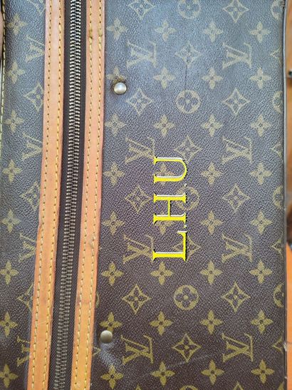 LOUIS VUITTON
Set of two soft suitcases and...