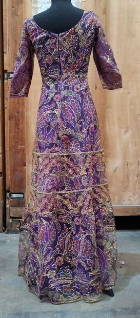 CARVEN
Long dress with green and purple background...
