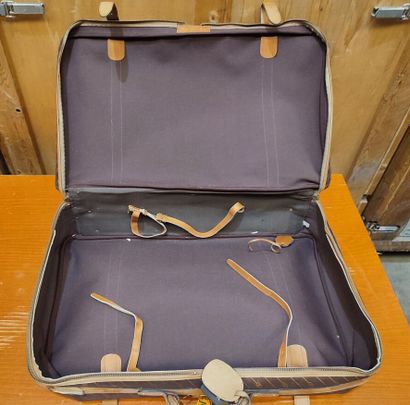 GUCCI
Set of two suitcases in monogrammed...