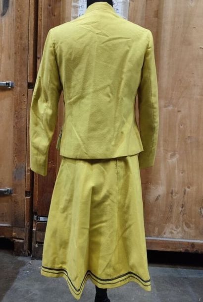 CARVEN
Outfit in yellow fabric with black...