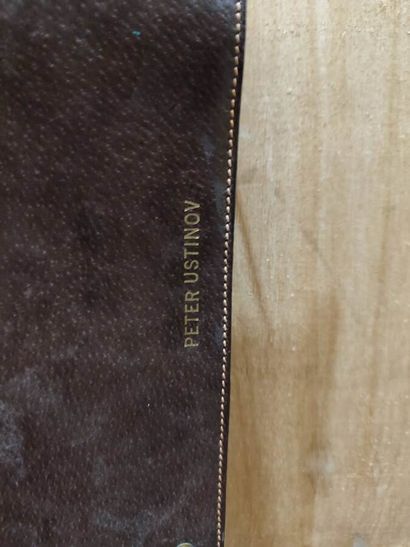 GUCCI
Leather and leatherette travel tie-holder
Marked...
