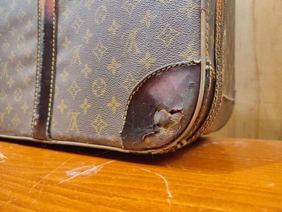 LOUIS VUITTON
Set of two soft suitcases and...