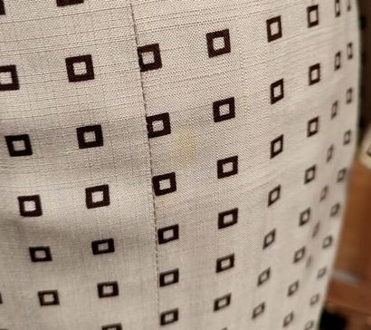 CARVEN
Outfit in cream fabric patterned with...