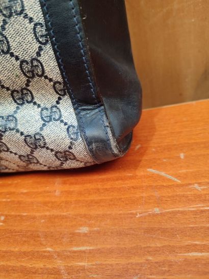GUCCI
Set of three handbags, two blue and...