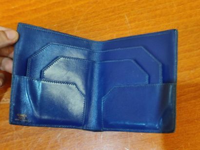 HERMES
Set of small leather goods including...