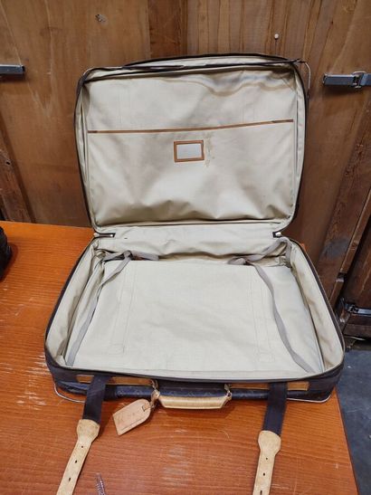 LOUIS VUITTON
Set of two soft suitcases and...