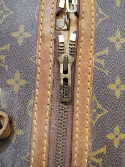 LOUIS VUITTON
Set of two soft suitcases and...