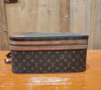LOUIS VUITTON
Set of three small travel bags:...