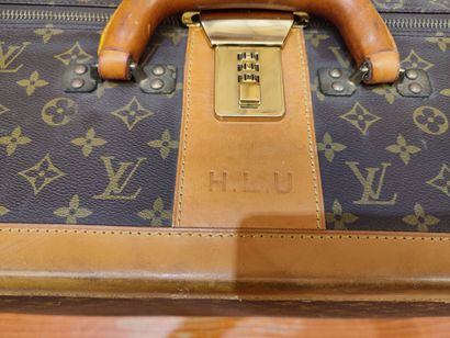 LOUIS VUITTON
Set of two soft suitcases and...