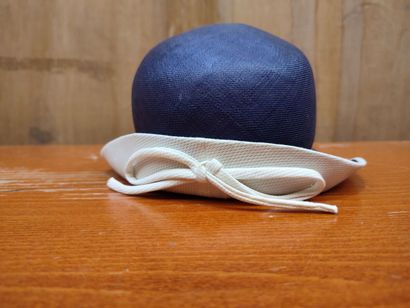 CARVEN
Set of two . hats, one navy blue and...
