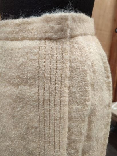 CARVEN
Outfit in cream and gold trim with...