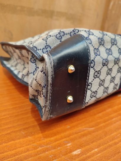 GUCCI
Set of three handbags, two blue and...