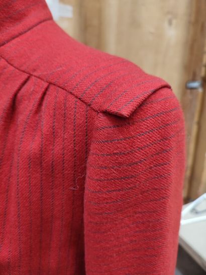 CARVEN
Outfit in red felt with fine black...