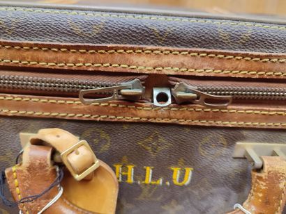LOUIS VUITTON
Set of two soft suitcases and...