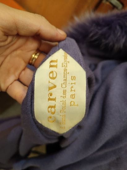CARVEN
Purple cape with fur bottom in the...