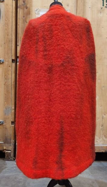 Set including a red cape (stained) and a...