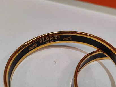 HERMES
Set of two enameled anchor bracelets,...