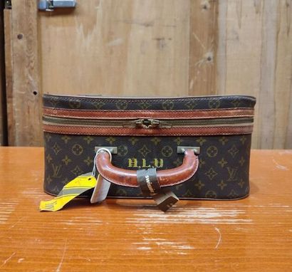 LOUIS VUITTON
Set of three small travel bags:...