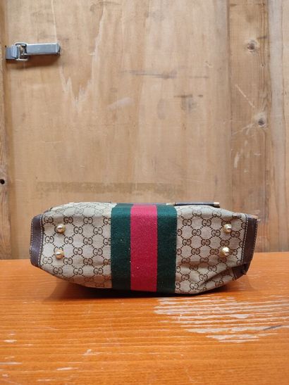 GUCCI
Set of three handbags, two blue and...