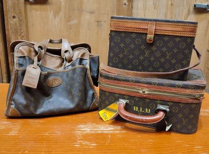 LOUIS VUITTON
Set of three small travel bags:...