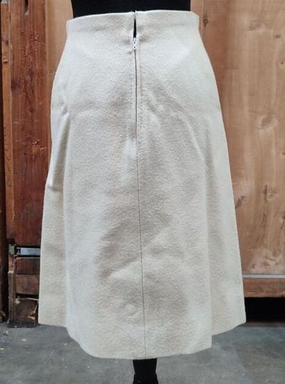 CARVEN
Cream wool ensemble with long jacket,...
