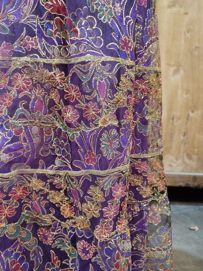 CARVEN
Long dress with green and purple background...
