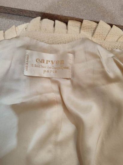 CARVEN
Set in yellow fabric with pleated...