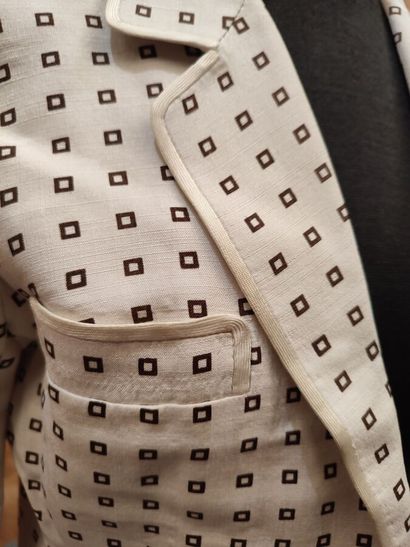 CARVEN
Outfit in cream fabric patterned with...