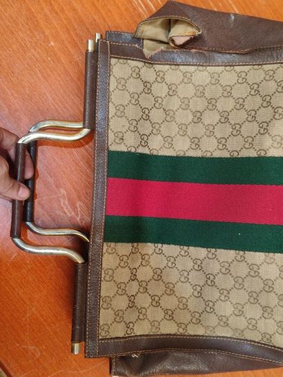 GUCCI
Set of three handbags, two blue and...