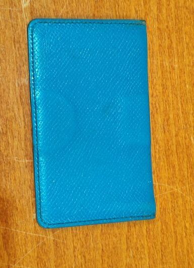 HERMES
Set of small leather goods including...