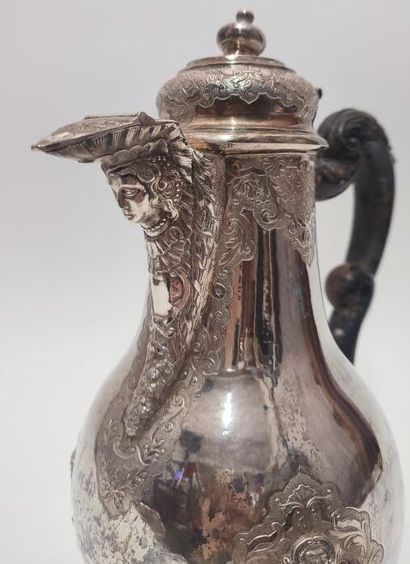 Silver tripod coffee pot, with scrolled feet...