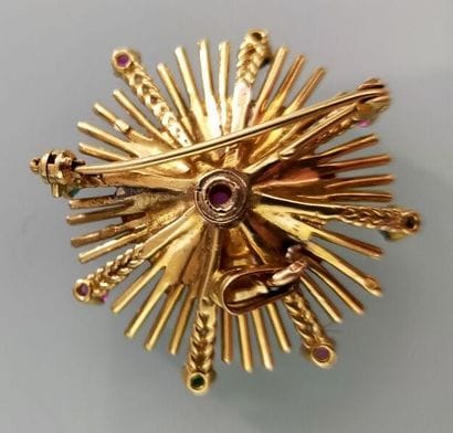 Brooch pendant in 75-thousandths yellow gold...