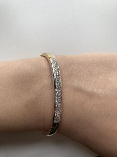 Rigid, opening bracelet in two-tone 750 thousandths...