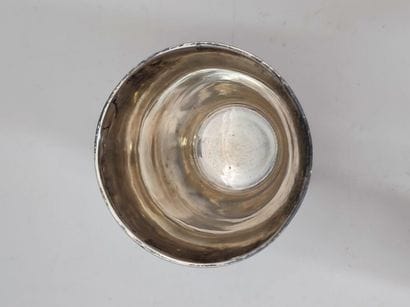 A silver tulip-shaped kettledrum decorated...