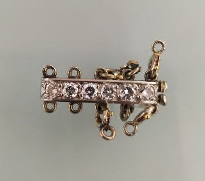 750 thousandths white gold clasp set with...