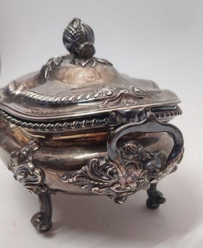 A silver oval soup tureen, the handles and...