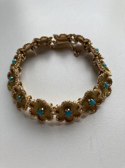 Articulated bracelet in engraved and diamond-patterned...
