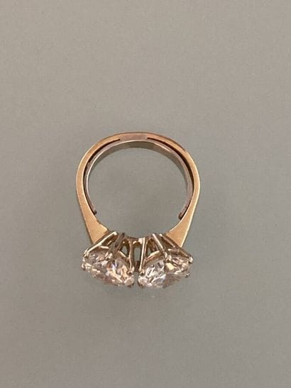 Round brilliant-cut diamond on paper.

Accompanied...