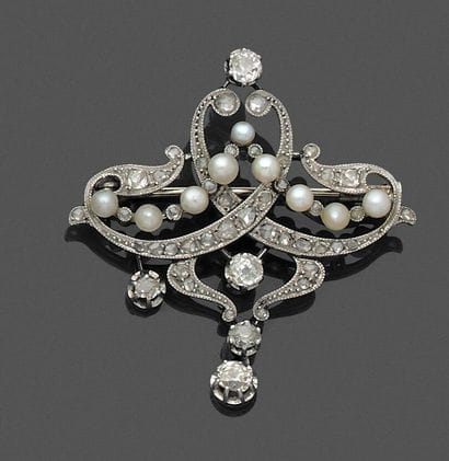 Broche en platine 850 millièmes et or gris...