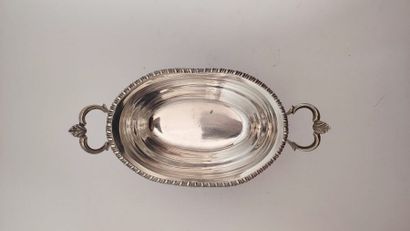 A quadripod sugar bowl with handles in silver...
