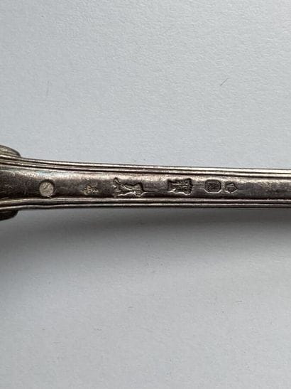 Silver ladle, contoured filets pattern, numbered...