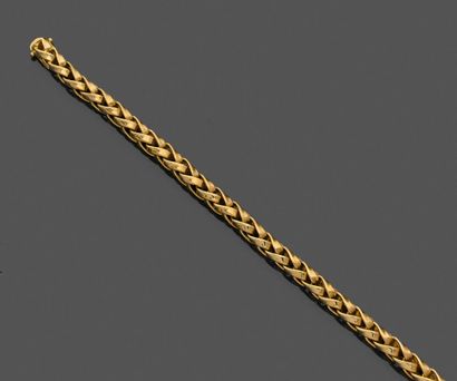 Bracelet articulé en or jaune 750 millièmes,...