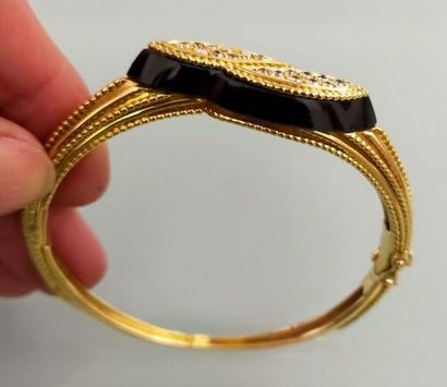 Rigid, opening bracelet in 750 thousandths...