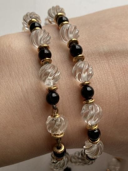 Long necklace and bracelet adorned with rock...