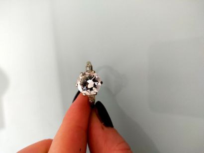 Ring in 750 thousandths white gold adorned...