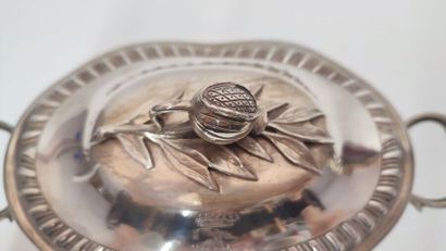 A quadripod sugar bowl with handles in silver...