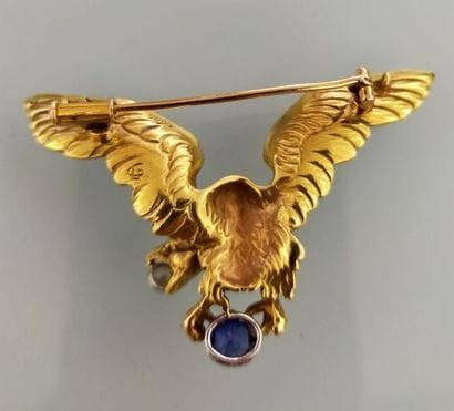 Broche pouvant former pendentif en or jaune...