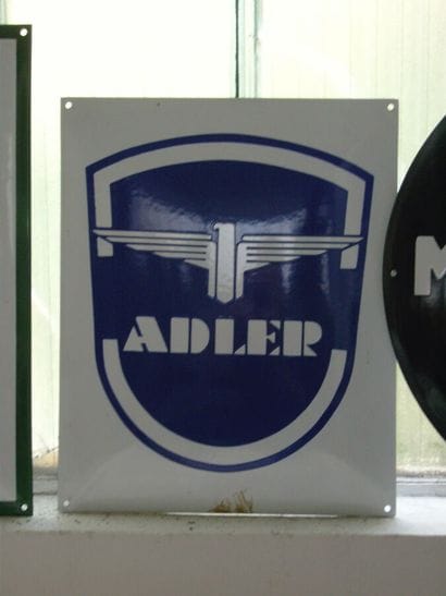 29 enamelled plates and screen-printed sheets...