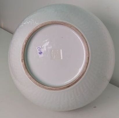 CHINA
White enameled porcelain vase with...