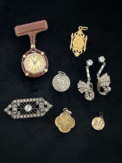 Miscellaneous metal lot including: four pendants,...